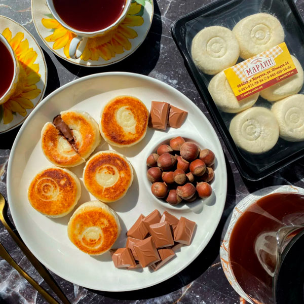 Фото Сырники с шоколадно-ореховой пастой